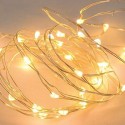 Cordón 50 LED grano de arroz funcionamiento a pilas luz cálida