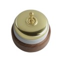Conmutador porcelana base madera oscura y tapa dorada